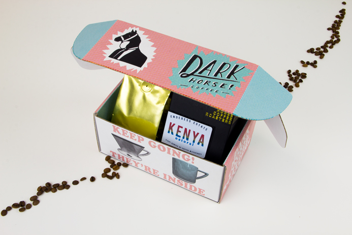 Colorful purple and blue custom package for Dark Horse's Kenya blend.